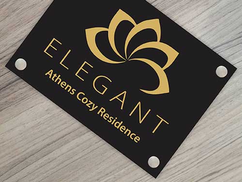 Επιγραφή σήμανσης airbnb hotel Elegant εσωτερικών - εξωτερικών χώρων σε μαύρο plexiglass με inox αποστάτες 